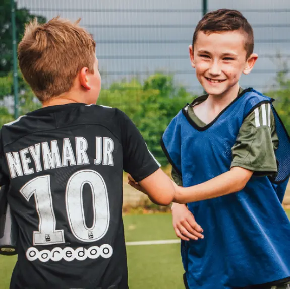 Benefits of kids playing football - social